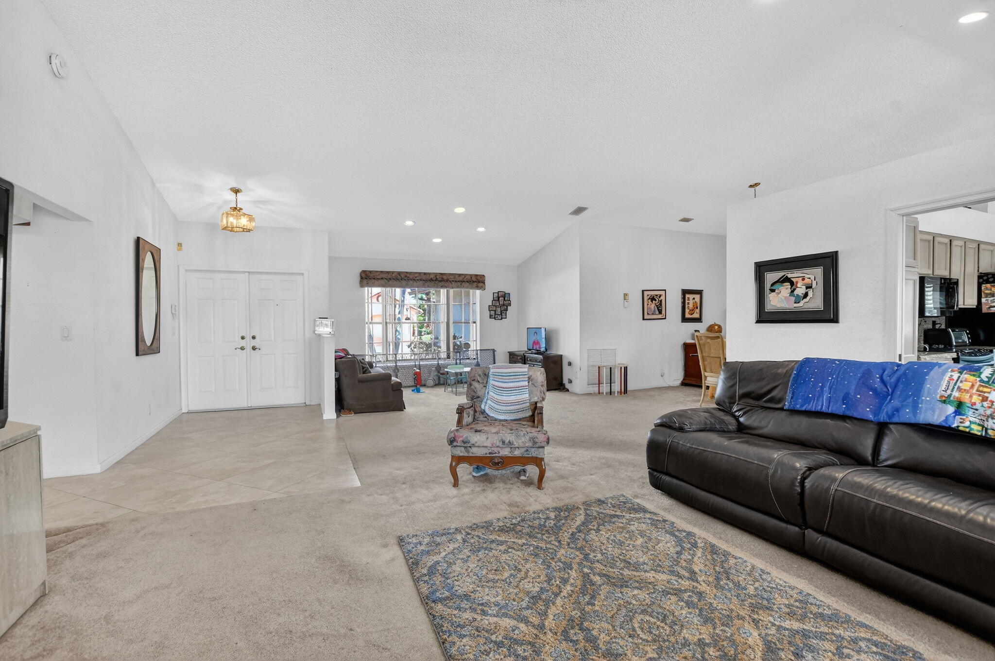 10226 Fresh Meadow Lane Boca Raton, FL 33498 - Photo 8 of 58 a living room with furniture and a couch