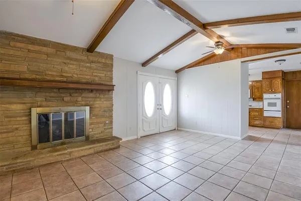 a view of an empty room and window