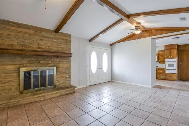 a view of an empty room and window