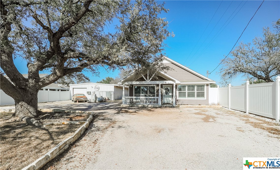 a view of a large house with a yard