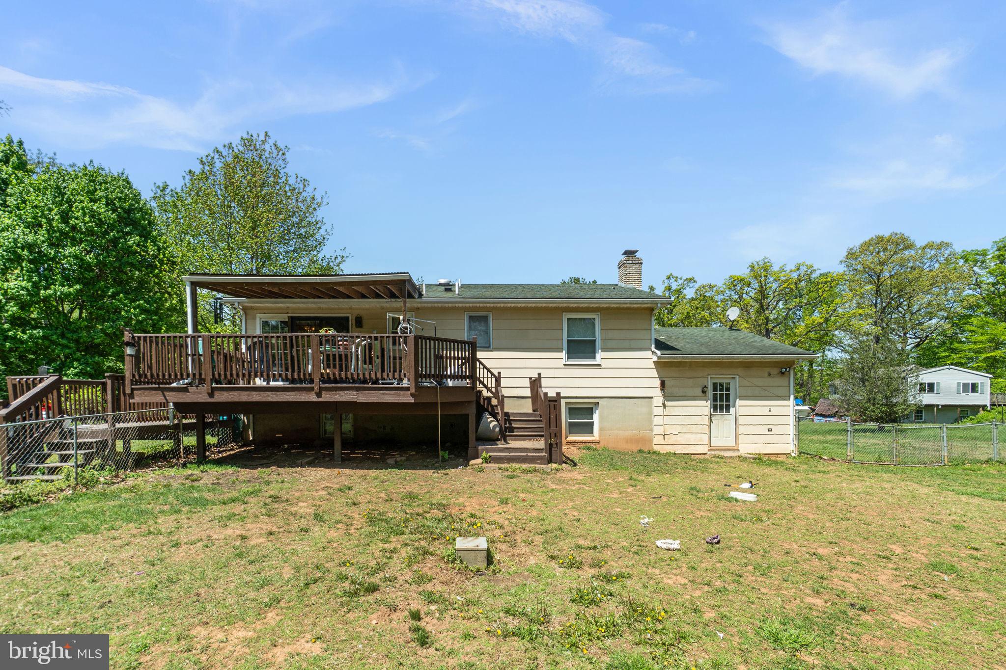6403 Ford Road Frederick, MD 21702 - Photo 17 of 19 a front view of a house with a yard