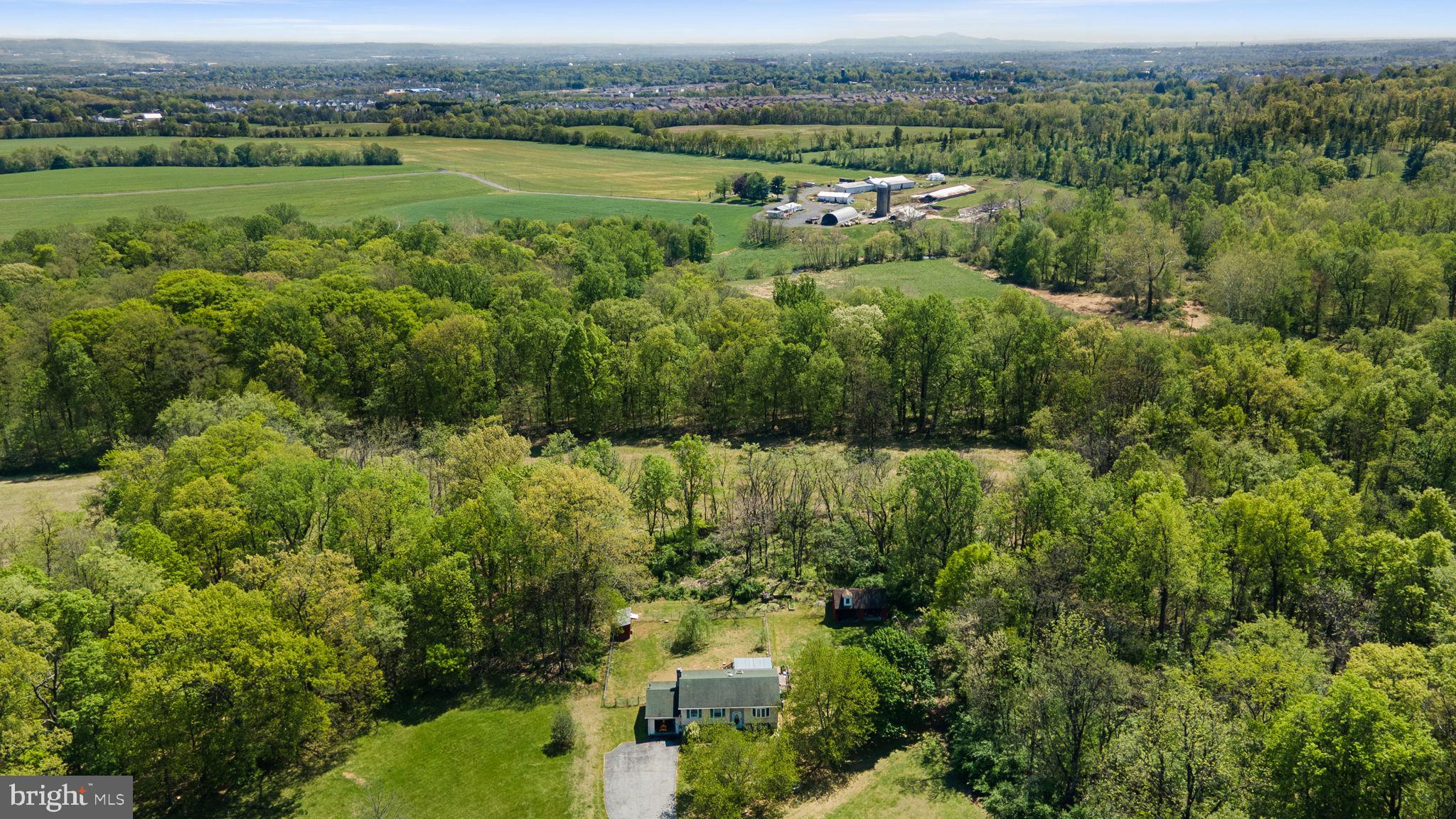 6403 Ford Road Frederick, MD 21702 - Photo 3 of 19 an aerial view of a houses with a yard