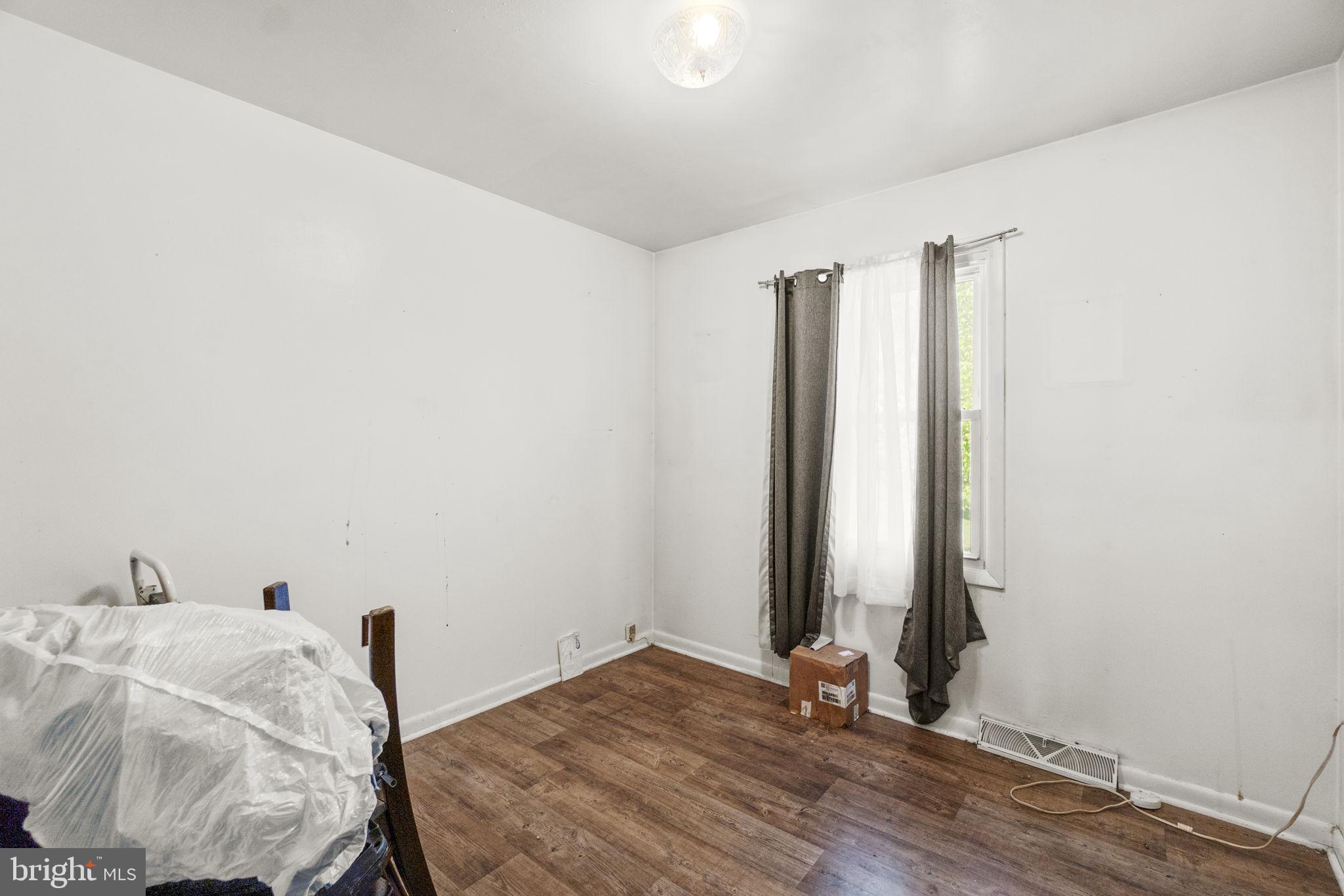 6403 Ford Road Frederick, MD 21702 - Photo 9 of 19 a bedroom with a bed and a window