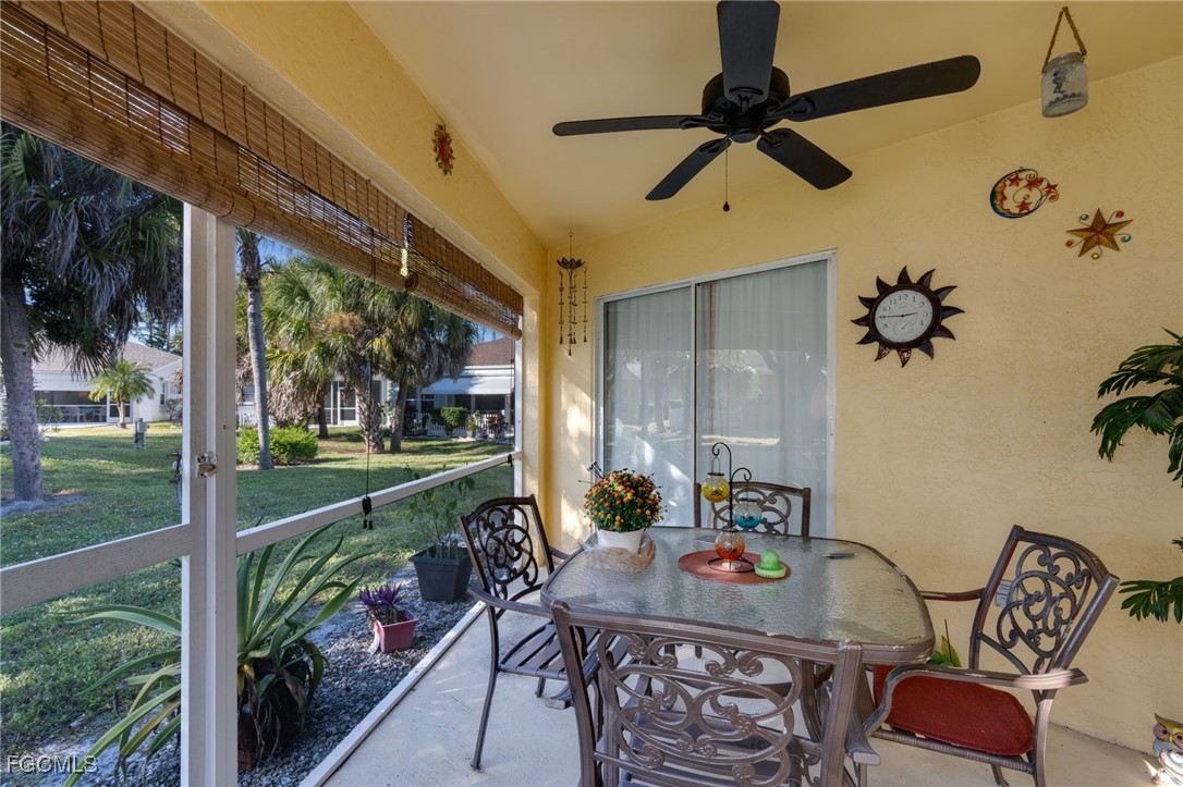 10741 Rio Mar Circle Estero, FL 33928 - Photo 14 of 23 a view of a dining room with furniture window and outside view