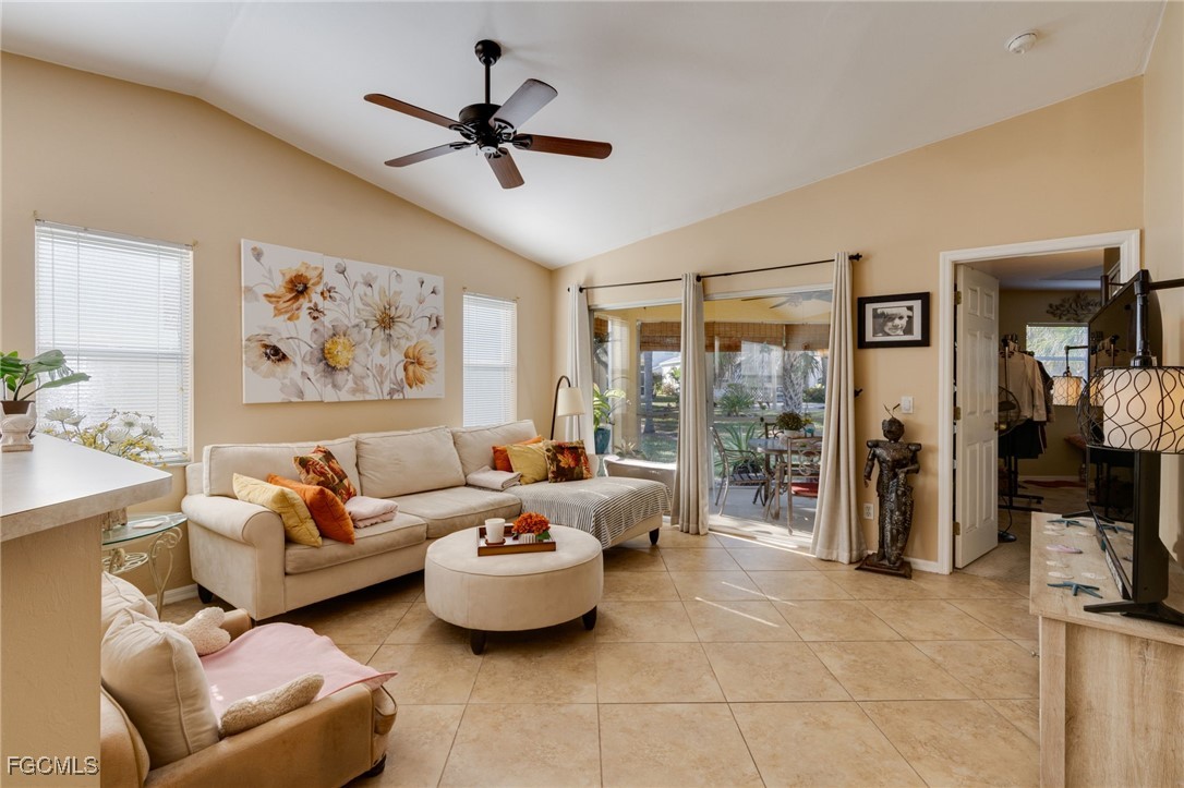 10741 Rio Mar Circle Estero, FL 33928 - Photo 2 of 23 a living room with furniture and a window