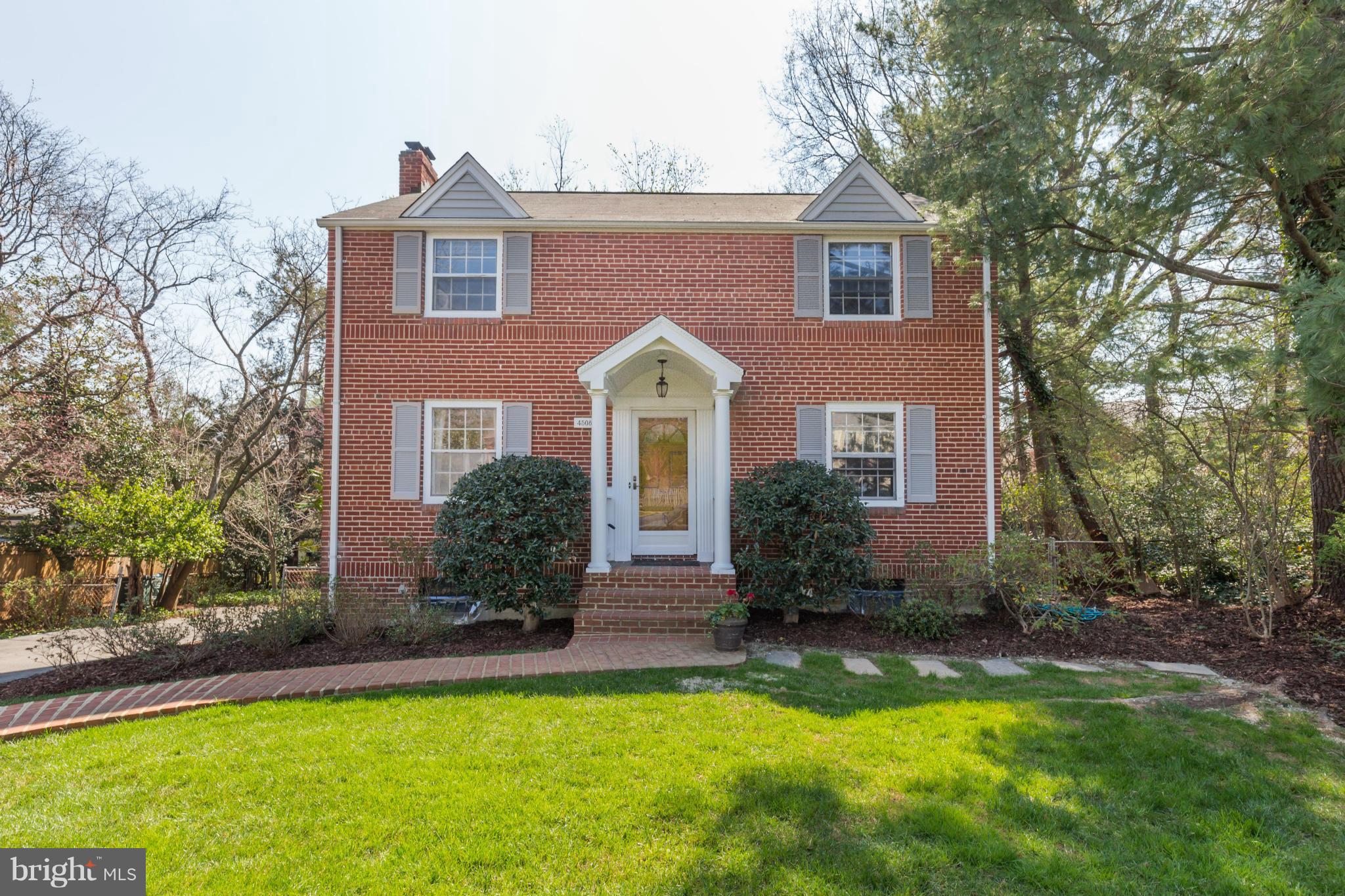 4508 19th Road North Arlington, VA 22207 - Photo 2 of 30 a front view of a house with a yard