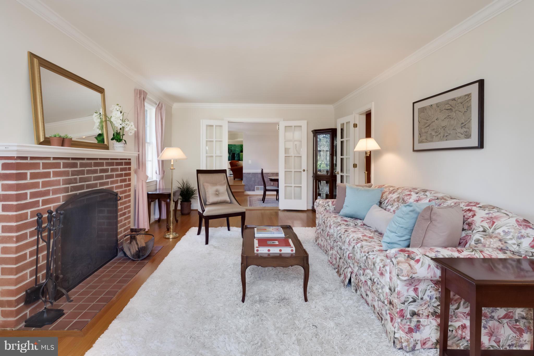 4508 19th Road North Arlington, VA 22207 - Photo 3 of 30 a living room with furniture and a fireplace