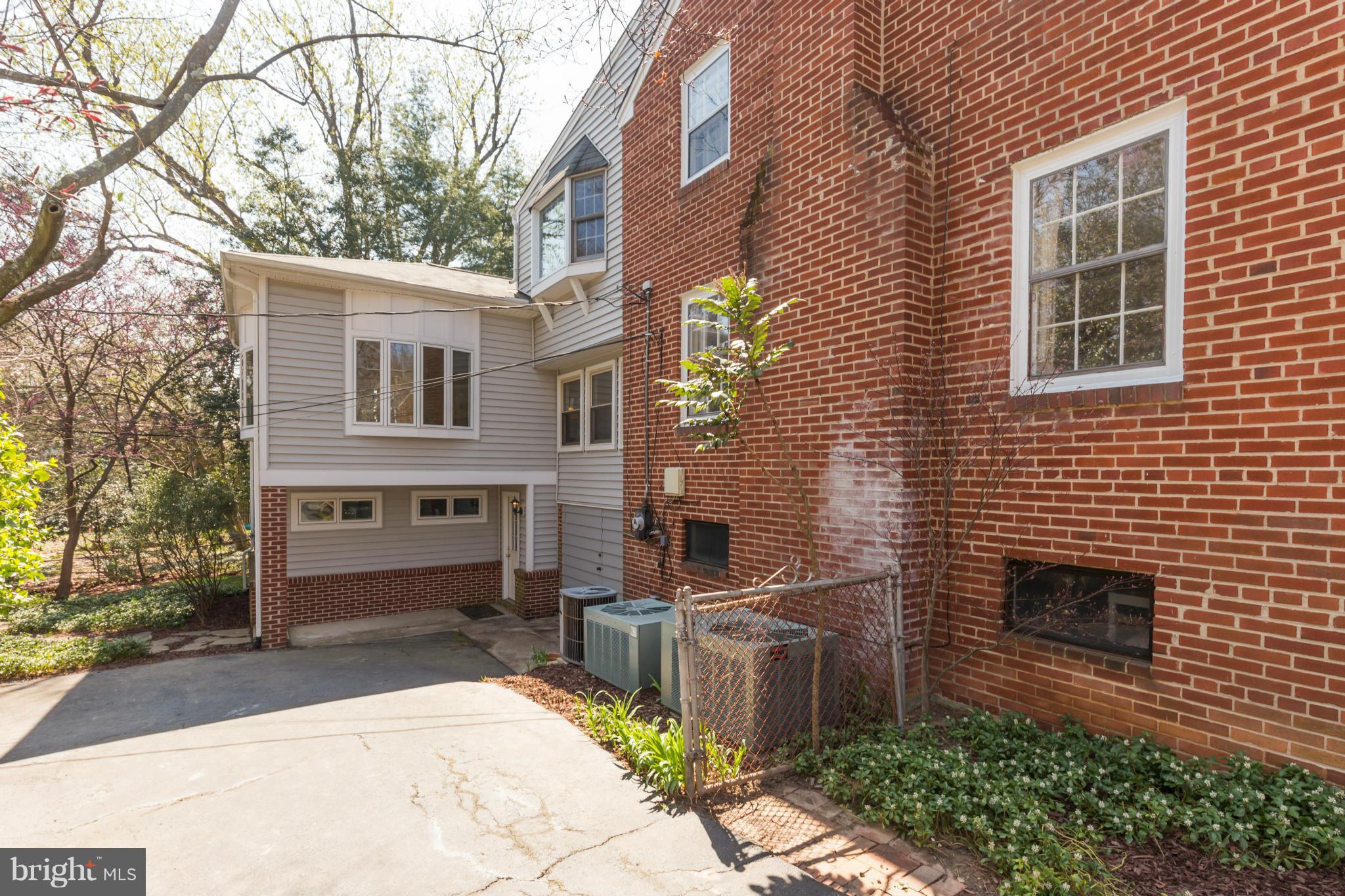 4508 19th Road North Arlington, VA 22207 - Photo 30 of 30 a front view of a house with a yard