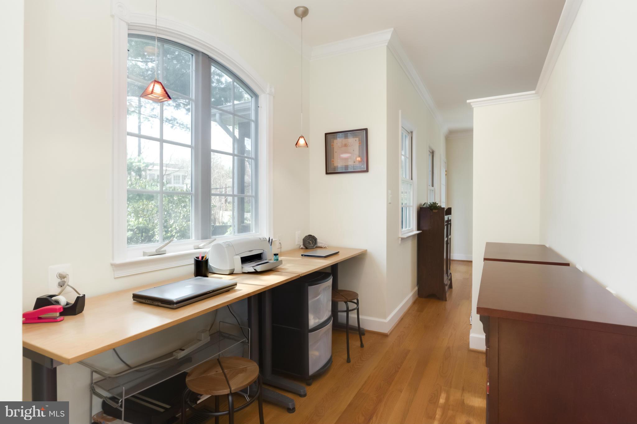 4508 19th Road North Arlington, VA 22207 - Photo 7 of 30 a kitchen with a sink cabinets and wooden floor