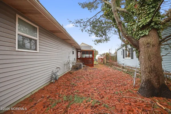 a house view with a backyard space