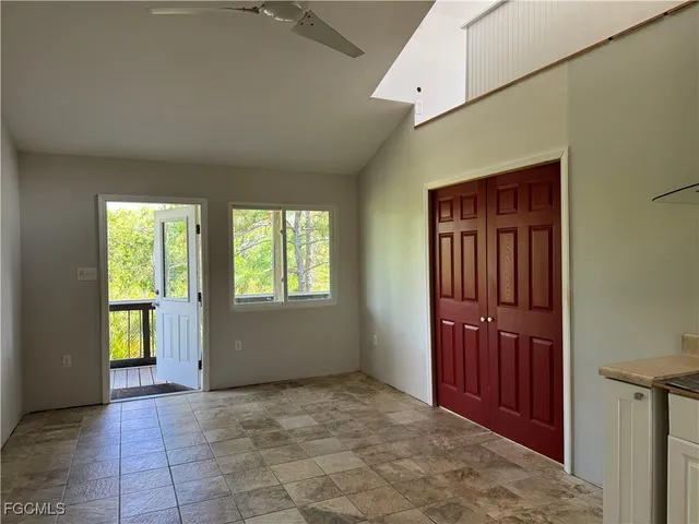 an empty room with windows