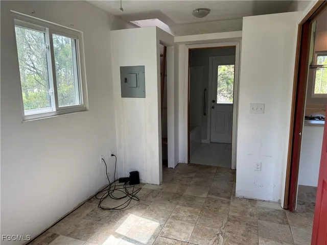 a view of a room with windows