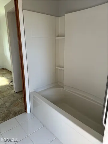 a bathroom with a bathtub