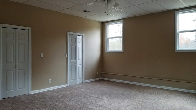 2913 Graham Road Gray, GA 31032 - Photo 8 of 18 an empty room with windows