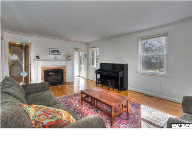 1407 Rutledge Avenue Charlottesville, VA 22903 - Photo 5 of 24 With several windows, the room is bright and sunny. All the windows in the house were replaced in 2006. Freshly painted throughout, the entire house is fresh and bright.