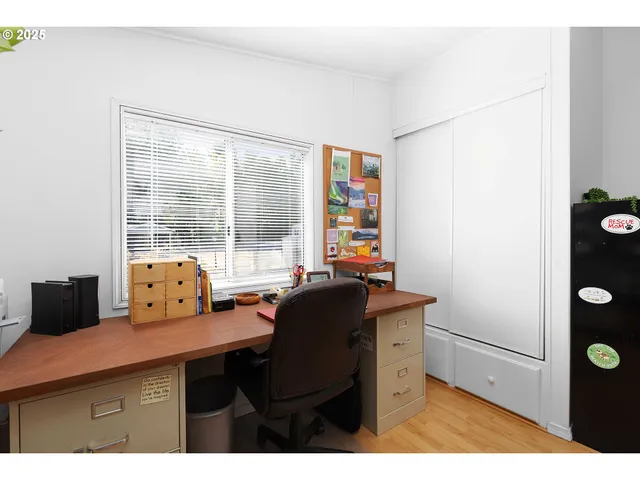a view of workspace with wooden floor
