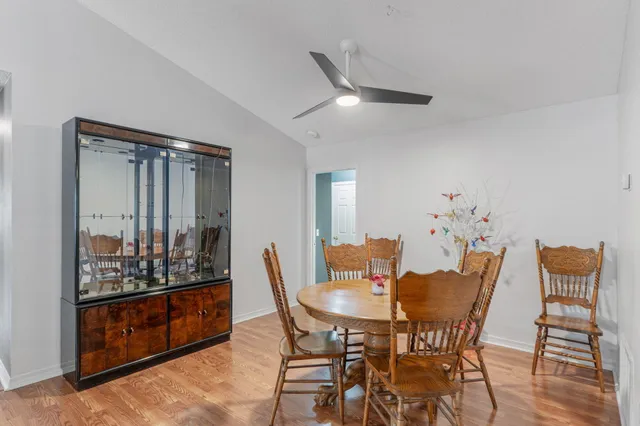 a view of a dining room with furniture