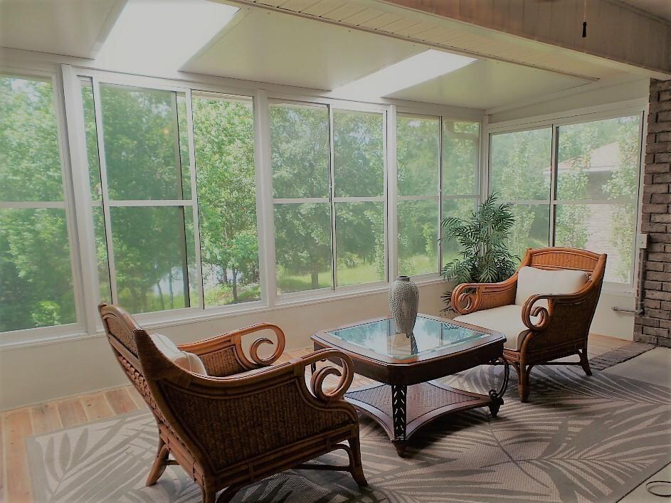 211 Foxchase Way Crestview, FL 32536 - Photo 12 of 24 a view of a dining room with furniture wooden floor and a potted plant
