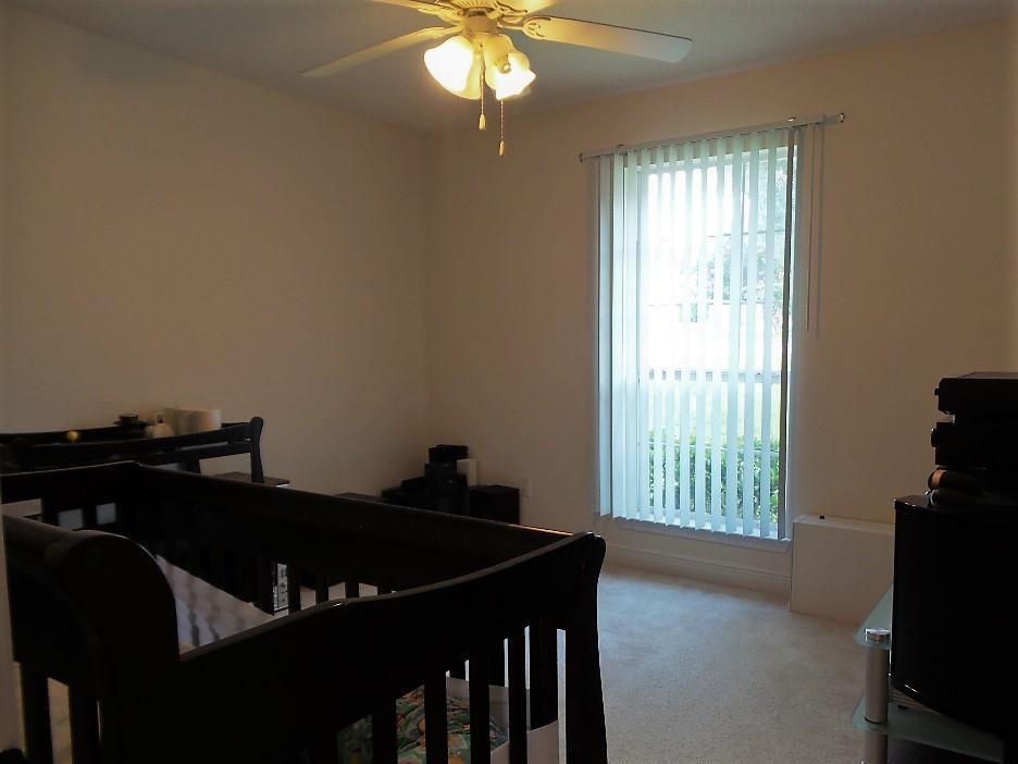 211 Foxchase Way Crestview, FL 32536 - Photo 17 of 24 a living room with furniture and a window