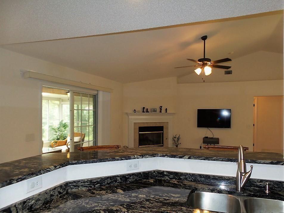 211 Foxchase Way Crestview, FL 32536 - Photo 7 of 24 a living room with furniture and a flat screen tv