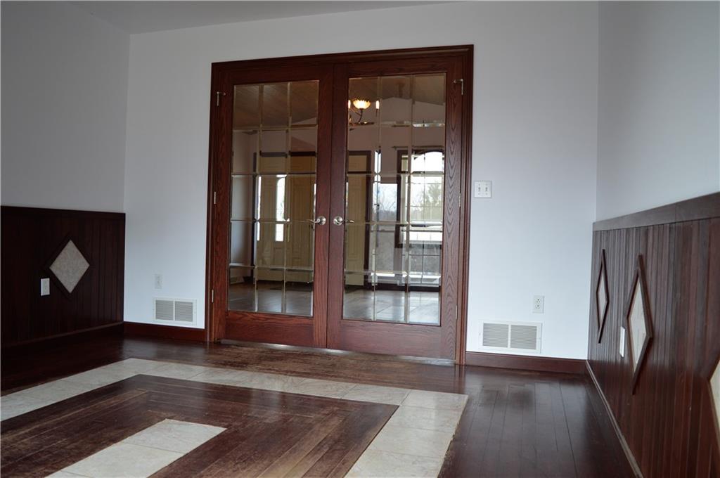783 West Old Rte 422 Butler, PA 16001 - Photo 11 of 25 Flooring and doors in dining room