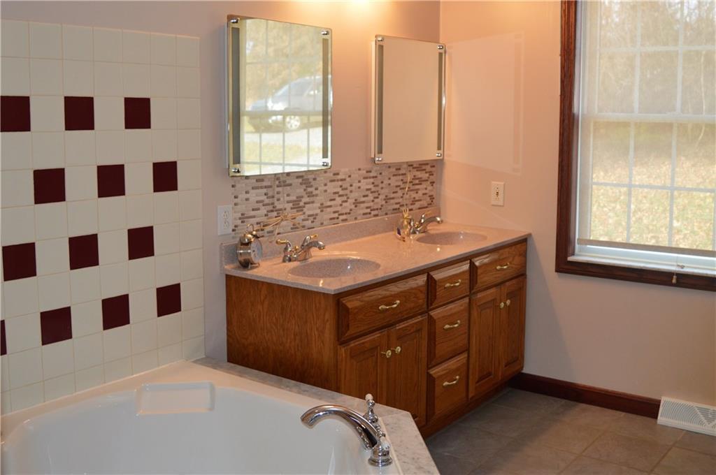 783 West Old Rte 422 Butler, PA 16001 - Photo 15 of 25 Jack and Jill Bathroom between bedrooms 2 and 3
