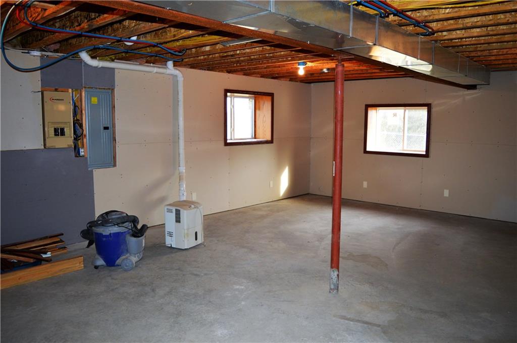 783 West Old Rte 422 Butler, PA 16001 - Photo 19 of 25 Basement Part 1 with Wired Generator and Electrical Panels