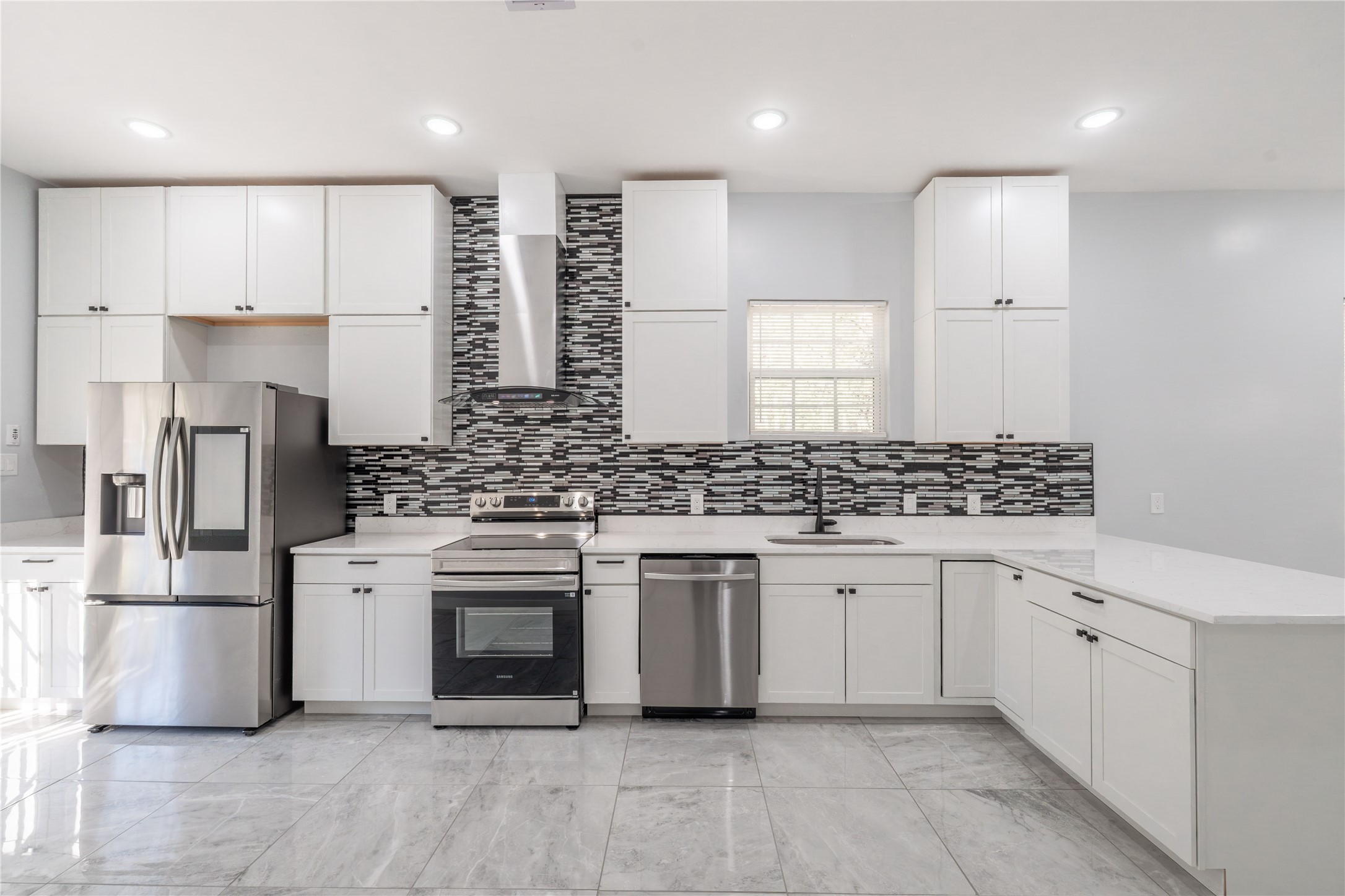 164 County Road 3370 Cleveland, TX 77327 - Photo 10 of 27 Your new home journey starts with a fully equipped kitchen featuring brand-new appliances.”