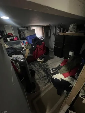 a room with lots of storage and a air conditioner