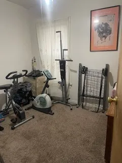 a view of room with gym equipment