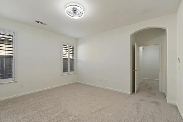 a balcony with view of outdoor space