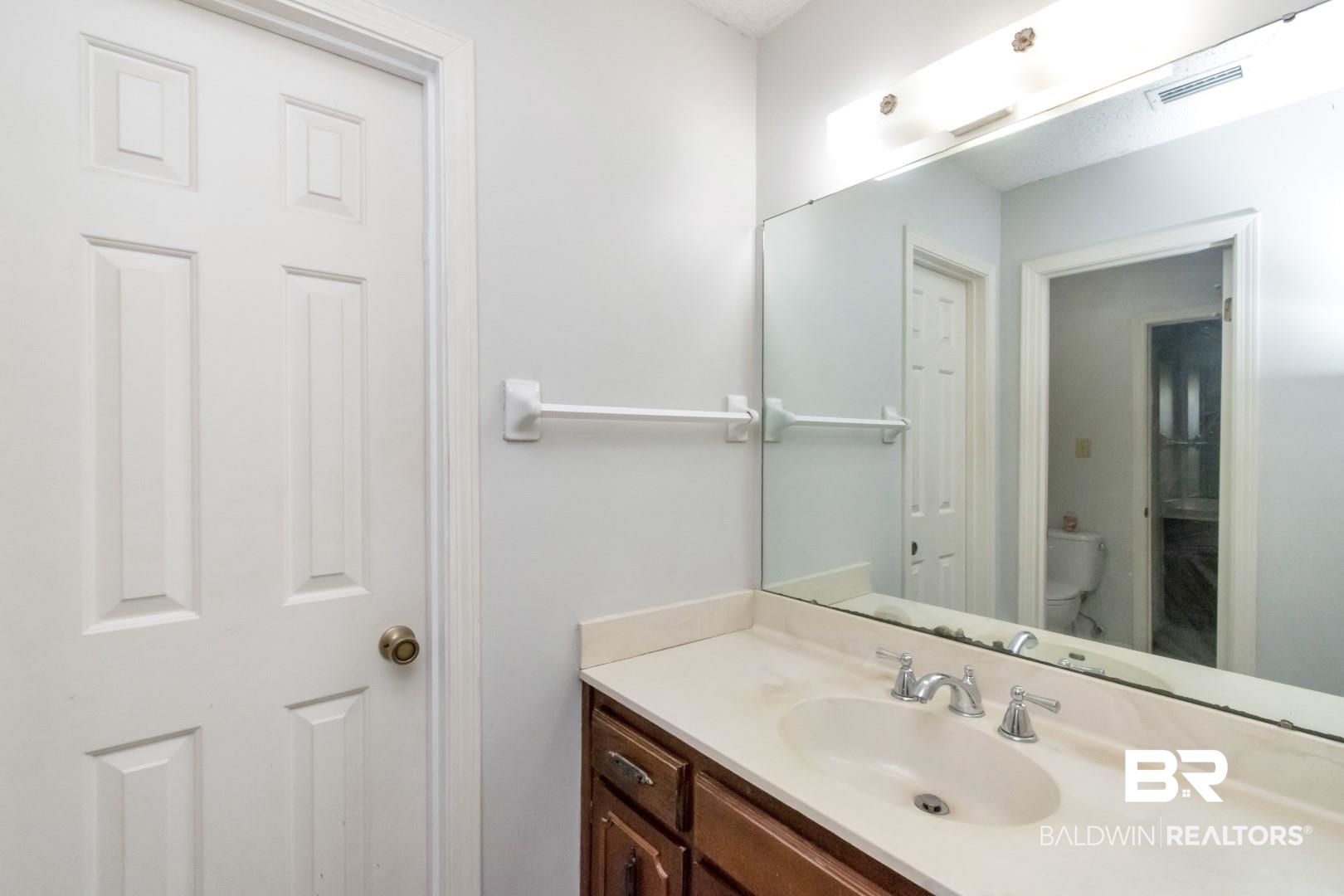 1229 West Chimney Top Drive Mobile, AL 36695 - Photo 22 of 36 Other side of Primary Bath Suite- Primary bath has separate his/her vanity areas. Each with it's own walk in closet. Tub/shower/toilet is in between. Great set up!