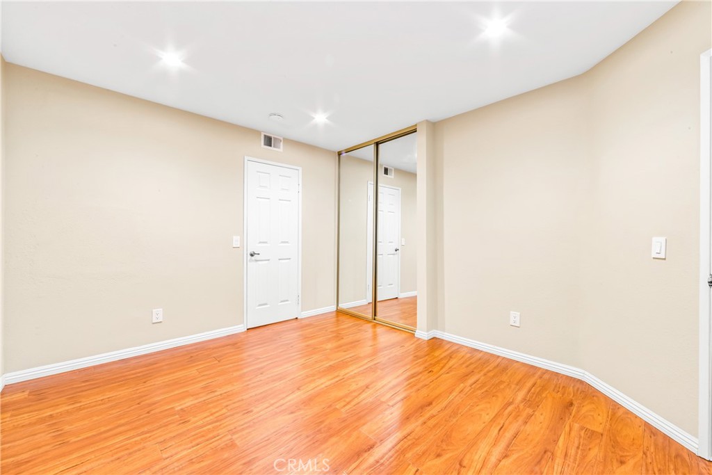 68 Marbella Aisle, Unit 34 Irvine, CA 92614 - Photo 15 of 38 Main floor bedroom suite. Bedroom #1