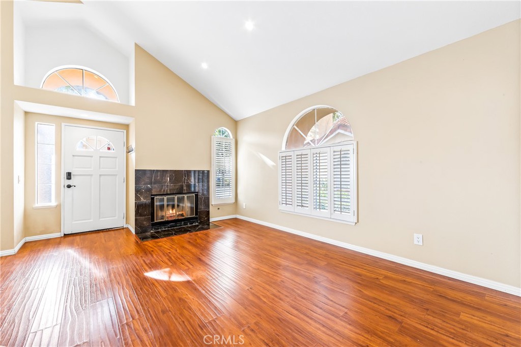 68 Marbella Aisle, Unit 34 Irvine, CA 92614 - Photo 2 of 38 Vaulted ceilings with excellent natural light.