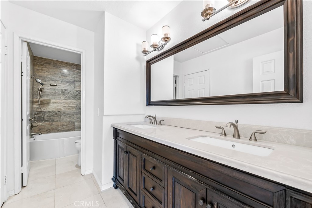 68 Marbella Aisle, Unit 34 Irvine, CA 92614 - Photo 24 of 38 Bathroom with access from bedrooms 2 and 3