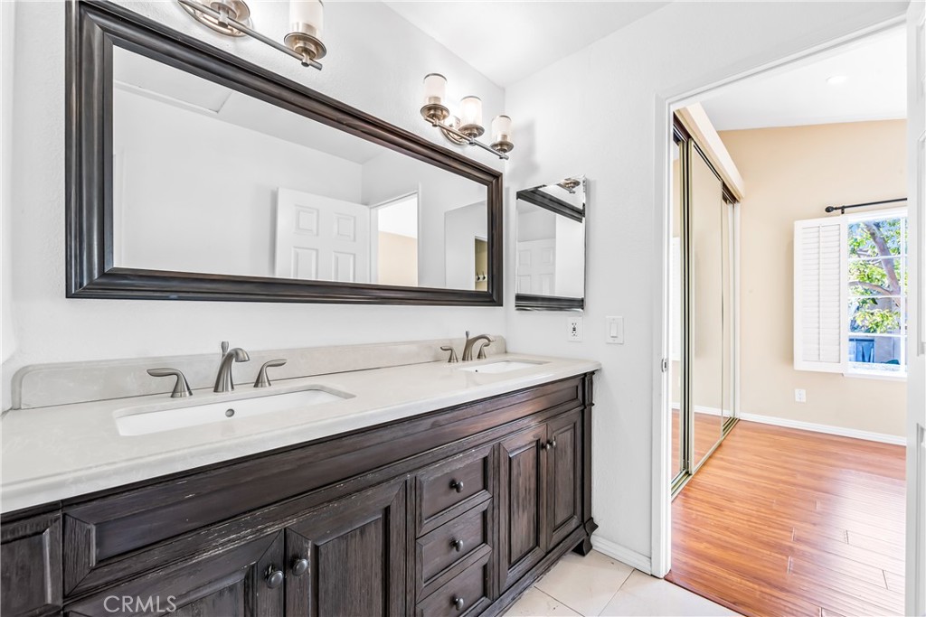 68 Marbella Aisle, Unit 34 Irvine, CA 92614 - Photo 25 of 38 Jack-and-Jill Bathroom for Bedrooms #2 and #3