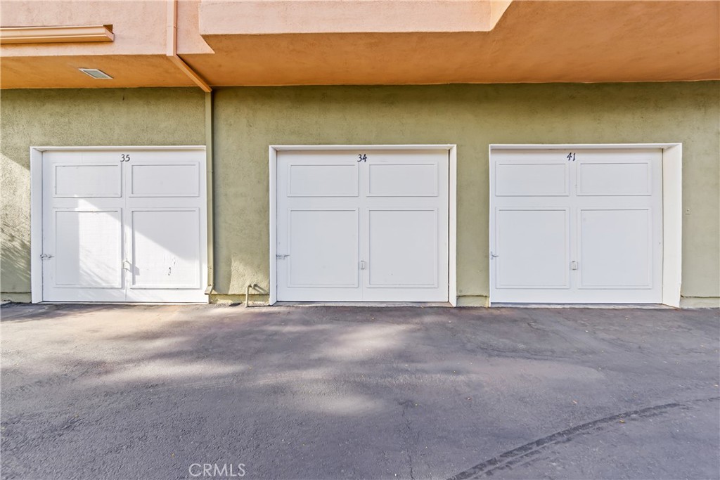 68 Marbella Aisle, Unit 34 Irvine, CA 92614 - Photo 34 of 38 Attached garage with direct access to the house.