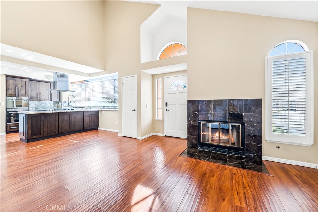 68 Marbella Aisle, Unit 34 Irvine, CA 92614 - Photo 4 of 38 Kitchen and living room.