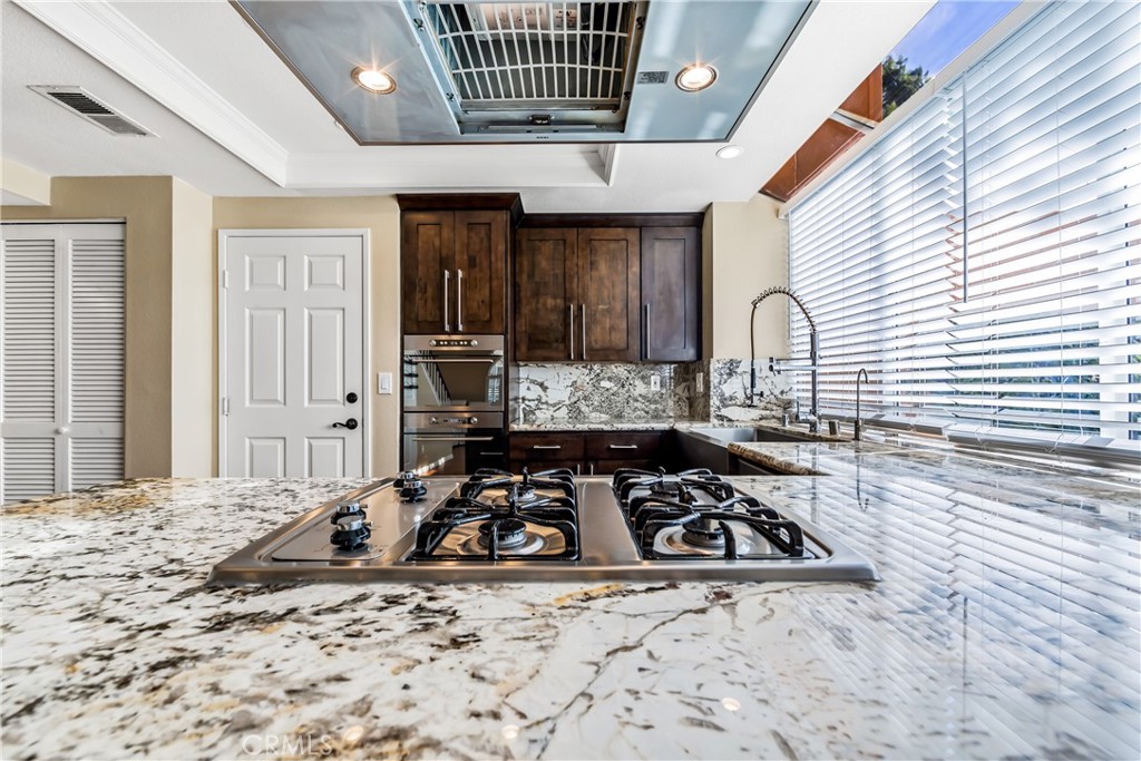 68 Marbella Aisle, Unit 34 Irvine, CA 92614 - Photo 8 of 38 Kitchen detail.