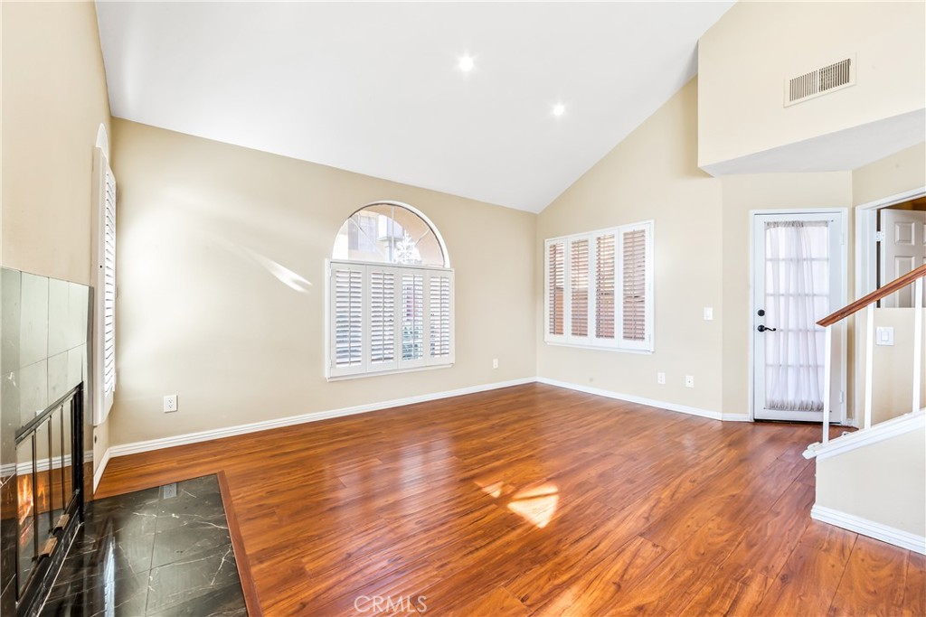 68 Marbella Aisle, Unit 34 Irvine, CA 92614 - Photo 9 of 38 Private patio is accessible from the living room.