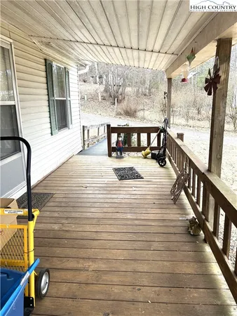 a view of a balcony with chairs