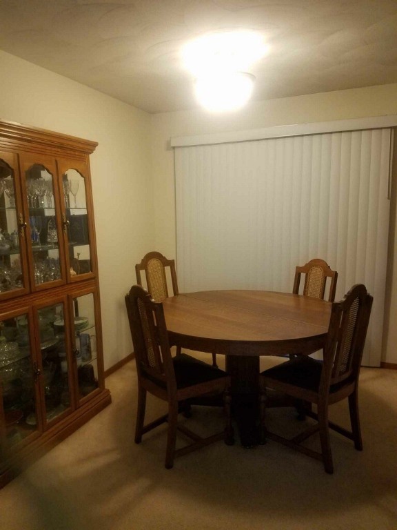 45 North Lynette Drive Decatur, IL 62526 - Photo 7 of 11 a view of a dining room with furniture and window