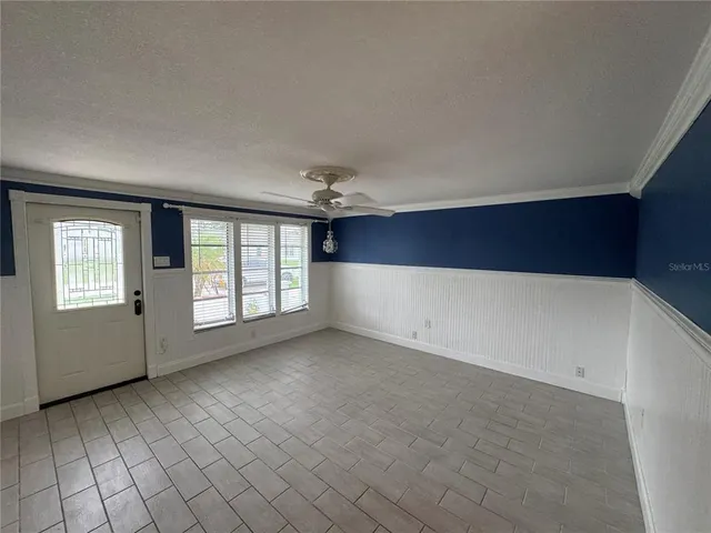 an empty room with windows