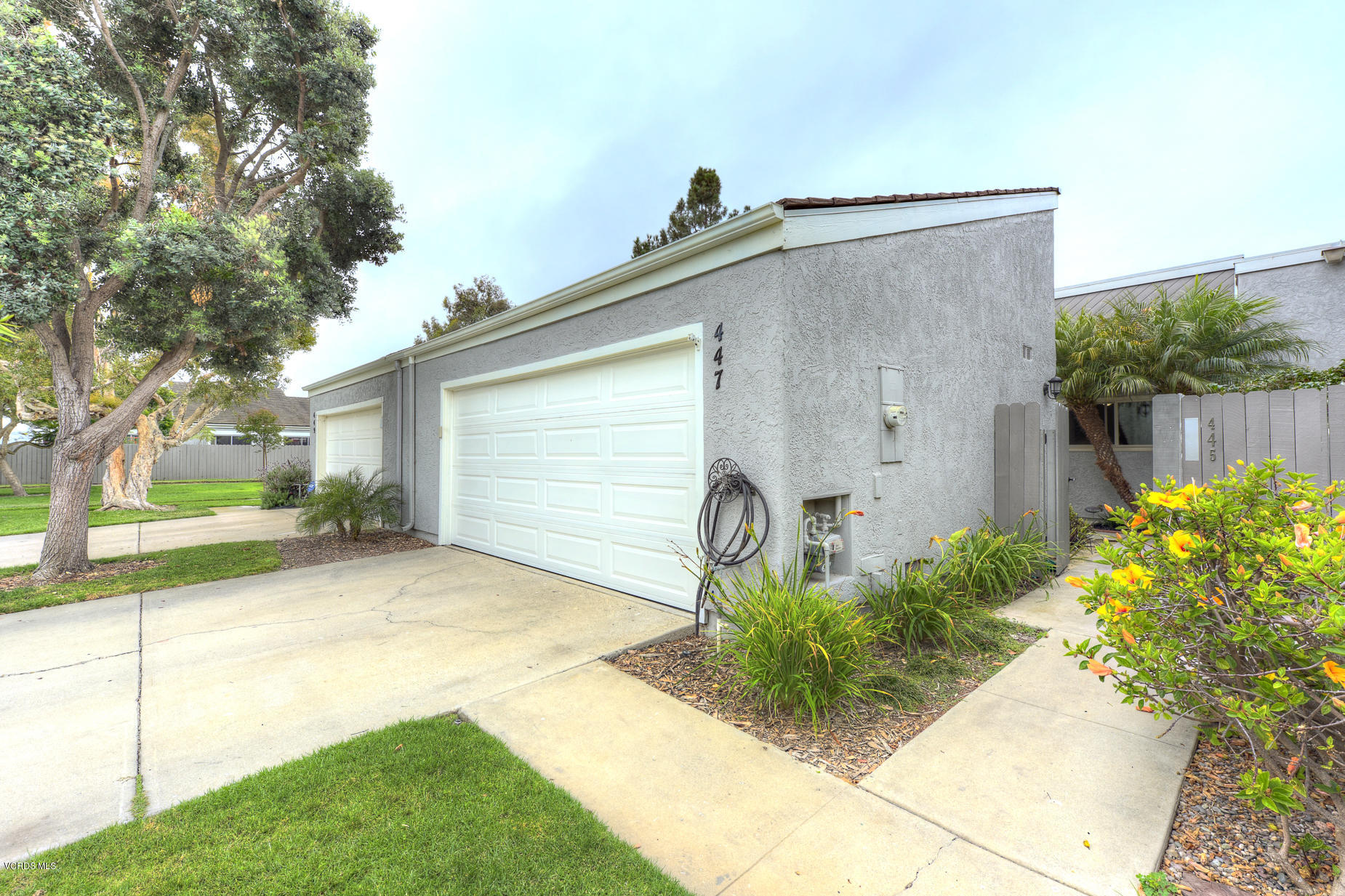 447 Reed Way Port Hueneme, CA 93041 - Photo 3 of 38 a front view of a house with garden