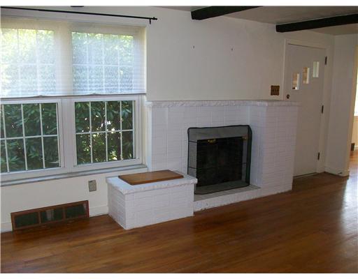 115 Marlboro Road Pittsburgh, PA 15238 - Photo 2 of 10 Living Room. Cozy Living Room with Fireplace, Hardwood Floors and Beamed Ceiling