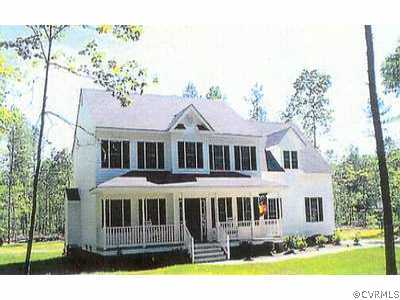 Lot 117 Takach Road Prince George, VA 23875 - Photo 1 of 1 a front view of a house with a garden