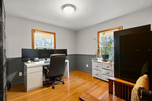 a workspace with furniture and window