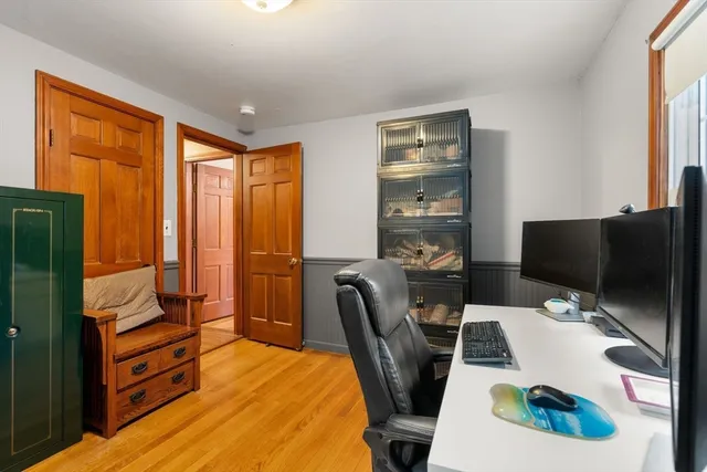 a workspace with furniture and window