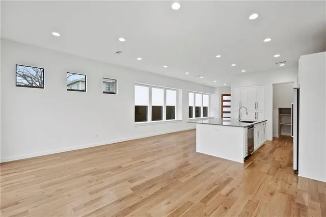 a view of kitchen with wooden floor
