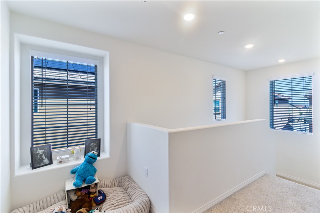 2448 Powell Drive Rialto, CA 92377 - Photo 7 of 30 a living room with furniture and window